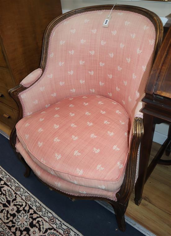 A pair of French Louis XV style beech armchairs